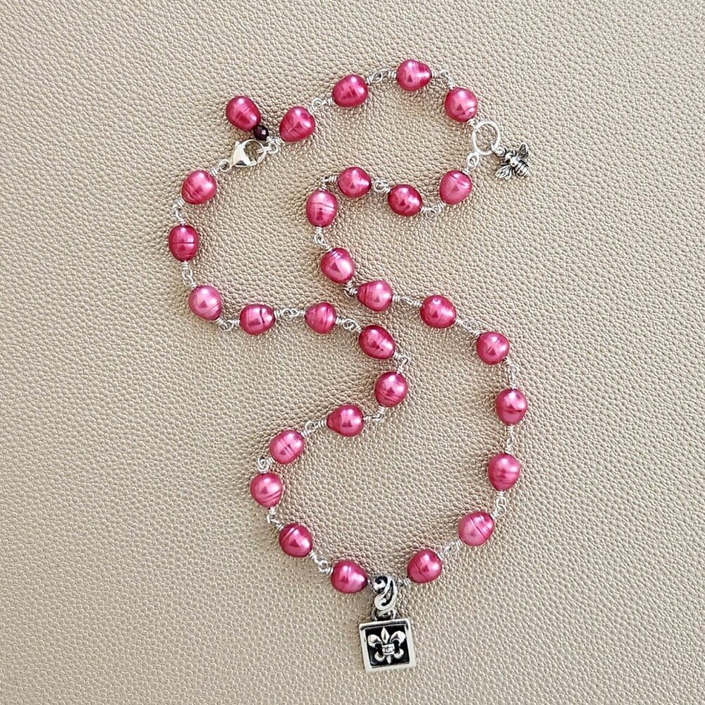 DARK PINK PEARL NECKLACE W/ FLEUR DE LIS PENDANT